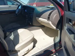 2001 Cadillac Catera z VIN W06VR54R01R003061, wystawiony jako IAAI lot #41989882 z przebiegiem 77 248 mil mil oraz . Historia ofert i sprzedaży dostępna na DreamBid. Obrazek 5.