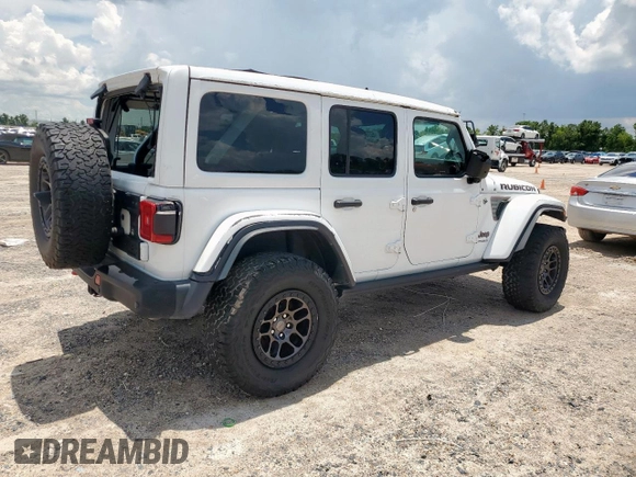 2021 Jeep Wrangler Unlimited Rubicon with VIN 1C4JJXFG1MW849460, listed as a Copart auction lot 62701895 with 54,517 mi miles and Salvage title. Bid and sale history available at DreamBid. Image 3.