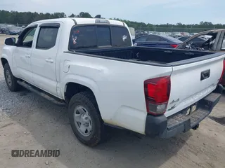 2022 Toyota Tacoma SR with VIN 3TYCZ5AN9NT098903, listed as a IAAI auction lot 42088505 with 93,000 mi miles and . Bid and sale history available at DreamBid. Image 3.