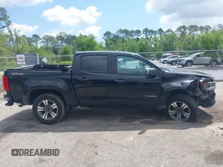 2018 Chevrolet Colorado 4WD Work Truck z VIN 1GCGTBEN9J1206595, wystawiony jako IAAI lot #42150736 z przebiegiem 176 880 mil mil oraz . Historia ofert i sprzedaży dostępna na DreamBid. Obrazek 13.