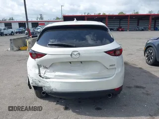 2018 Mazda CX-5 Grand Touring with VIN JM3KFBDM6J0451605, listed as a IAAI auction lot 42099182 with 81,703 mi miles and . Bid and sale history available at DreamBid. Image 16.
