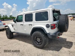 2021 Jeep Wrangler Unlimited Rubicon with VIN 1C4JJXFG1MW849460, listed as a Copart auction lot 62701895 with 54,517 mi miles and Salvage title. Bid and sale history available at DreamBid. Image 2.