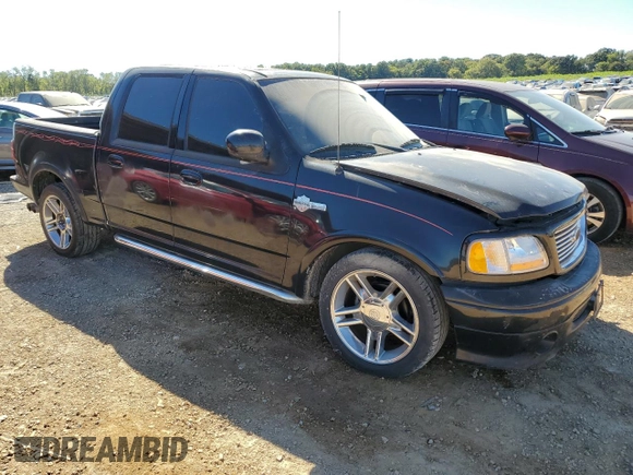 2002 Ford F-150 Harley Davidson with VIN 1FTRW07332KD46296, listed as a Copart auction lot 76333404 with 160,616 mi miles and Salvage Title. Bid and sale history available at carsss.com. Image 4.