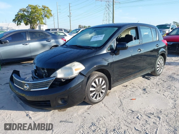 2009 Nissan Versa 1.8 SL with VIN 3N1BC13E79L476570, listed as a IAAI auction lot 41804750 with 160,449 mi miles. Bid and sale history available at carsss.com. Image 17.