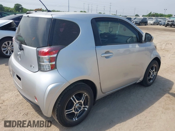 2012 Scion iQ with VIN JTNJJXB02CJ015746, listed as a IAAI auction lot 42266761 with 135,321 mi miles and . Bid and sale history available at DreamBid. Image 4.