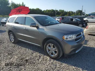 2013 Dodge Durango Crew with VIN 1C4RDHDG3DC596985, listed as a Copart auction lot 62218015 with 296,266 mi miles and Salvage title. Bid and sale history available at DreamBid. Image 4.