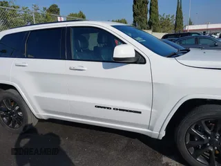2020 Jeep Grand Cherokee Altitude with VIN 1C4RJEAG2LC306195, listed as a IAAI auction lot 41626392 with 45,587 mi miles and . Bid and sale history available at DreamBid. Image 14.