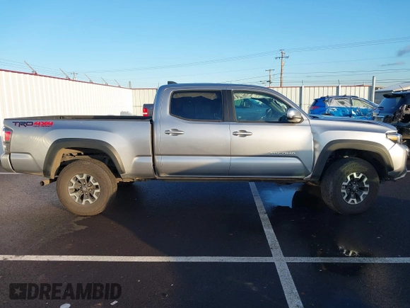 2023 Toyota Tacoma SR5 z VIN 3TMDZ5BN6PM156824, wystawiony jako IAAI lot #41031932 z przebiegiem 14 226 mil mil oraz . Historia ofert i sprzedaży dostępna na DreamBid. Obrazek 13.