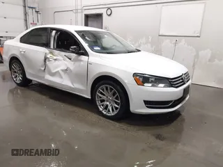 2014 Volkswagen Passat S with VIN 1VWAT7A3XEC114183, listed as a IAAI auction lot 41847112 with 97,245 mi miles and . Bid and sale history available at DreamBid. Image 1.