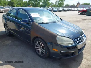 2006 Volkswagen Jetta 2.5L z VIN 3VWSF71K56M804345, wystawiony jako IAAI lot #42183312 z przebiegiem 156 395 mil mil oraz . Historia ofert i sprzedaży dostępna na DreamBid. Obrazek 1.