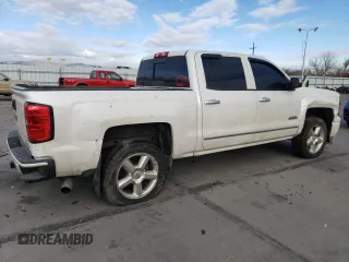 2014 Chevrolet Silverado 1500 High Country with VIN 3GCUKTEC4EG335555, listed as a Copart auction lot 86993214 with 216,596 mi miles and Salvage Title. Bid and sale history available at carsss.com. Image 3.