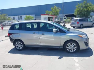 2012 Mazda Mazda5 Sport with VIN JM1CW2BL4C0103408, listed as a IAAI auction lot 42087883 with 219,601 mi miles. Bid and sale history available at carsss.com. Image 14.