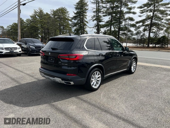 2019 BMW X5 xDrive40i with VIN 5UXCR6C57KLL62128, listed as a Copart auction lot 49959995 with 154,636 mi miles and Clean title. Bid and sale history available at DreamBid. Image 4.
