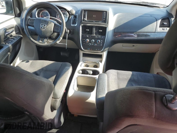 2014 Dodge Grand Caravan SXT z VIN 2C4RDGCG6ER223900, wystawiony jako Copart lot #56960965 z przebiegiem 101 275 mil mil oraz Szkoda całkowita • Salvage title. Historia ofert i sprzedaży dostępna na DreamBid. Obrazek 8.