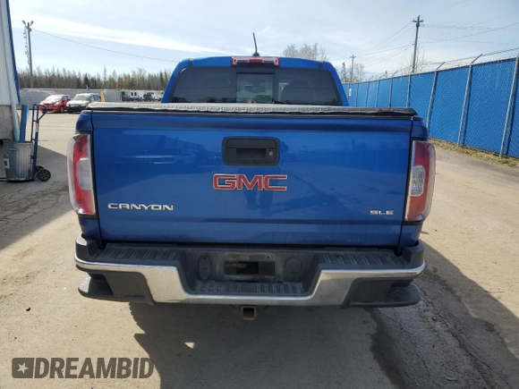 2018 GMC Canyon 4WD SLE z VIN 1GTG6CEN0J1262745, wystawiony jako Copart lot #54671585 z przebiegiem Nie podano mil oraz Szkoda całkowita • Salvage title. Historia ofert i sprzedaży dostępna na DreamBid. Obrazek 6.