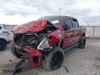 2015 Ford F-150 XLT with VIN 1FTEW1EG1FKF13111, listed as a IAAI auction lot 38107606 with 108,888 mi miles. Bid and sale history available at carsss.com. Image 2.