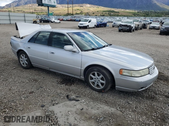 2003 Cadillac Seville Luxury SLS z VIN 1G6KS54Y53U262581, wystawiony jako Copart lot #55597595 z przebiegiem 80 832 mil mil oraz Szkoda całkowita • Salvage title. Historia ofert i sprzedaży dostępna na DreamBid. Obrazek 4.