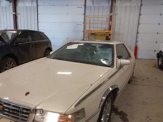 2002 Cadillac Eldorado ESC with VIN 1G6EL12Y82B102890, listed as a IAAI auction lot 41511915 with 79,116 mi miles. Bid and sale history available at carsss.com. Image 6.