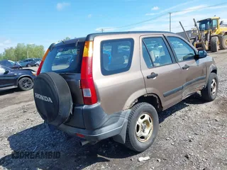 2002 Honda CR-V LX z VIN JHLRD78402C068542, wystawiony jako IAAI lot #42265409 z przebiegiem 205 650 mil mil oraz . Historia ofert i sprzedaży dostępna na DreamBid. Obrazek 4.
