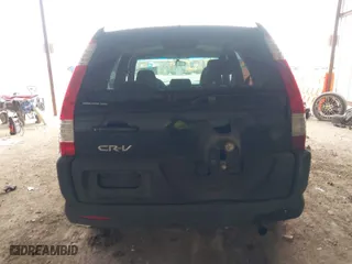 2005 Honda CR-V EX with VIN JHLRD78885C003297, listed as a IAAI auction lot 41614195 with 294,974 mi miles. Bid and sale history available at carsss.com. Image 16.