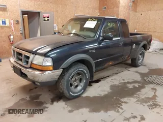2000 Ford Ranger XLT with VIN 1FTZR15XXYPB00604, listed as a IAAI auction lot 41390710 with 174,678 mi miles and . Bid and sale history available at DreamBid. Image 2.