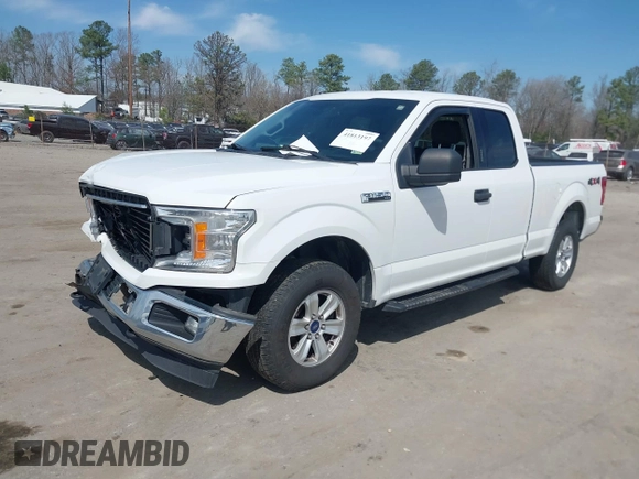2018 Ford F-150 XL with VIN 1FTEX1EB4JFA77373, listed as a IAAI auction lot 41813197 with 235,251 mi miles and . Bid and sale history available at DreamBid. Image 18.