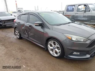 2015 Ford Focus ST with VIN 1FADP3L93FL321830, listed as a IAAI auction lot 41835529 with 106,901 mi miles. Bid and sale history available at carsss.com. Image 6.