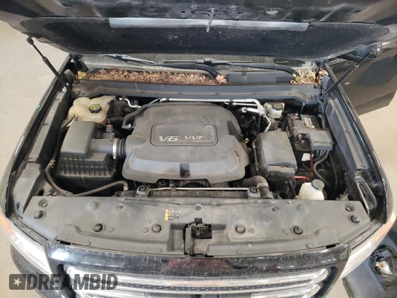 2015 GMC Canyon 4WD SLE with VIN 1GTH6BE32F1168788, listed as a Copart auction lot 76972934 with 158,562 mi miles and Salvage Title. Bid and sale history available at carsss.com. Image 11.