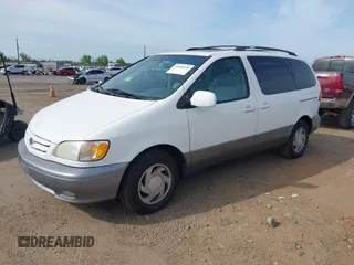 2002 Toyota Sienna LE with VIN 4T3ZF13CX2U506371, listed as a IAAI auction lot 42058440 with 215,434 mi miles. Bid and sale history available at carsss.com. Image 2.
