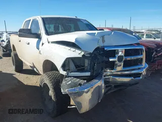 2015 Ram 2500 SLT with VIN 3C6UR5DL1FG623910, listed as a IAAI auction lot 41469020 with 139,877 mi miles. Bid and sale history available at carsss.com. Image 1.