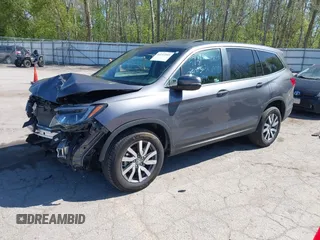 2020 Honda Pilot EX-L z VIN 5FNYF6H58LB049652, wystawiony jako IAAI lot #42213555 z przebiegiem 84 846 mil mil oraz . Historia ofert i sprzedaży dostępna na DreamBid. Obrazek 17.