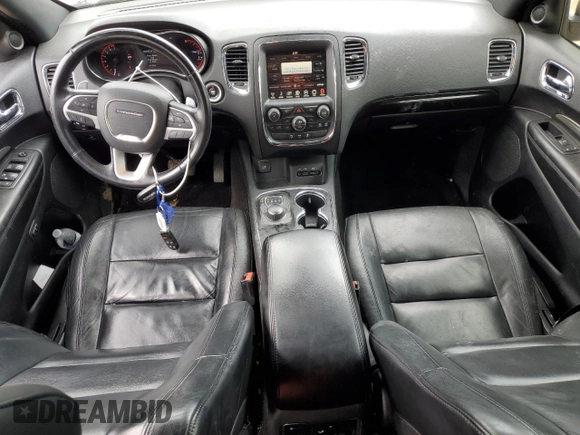 2015 Dodge Durango Limited with VIN 1C4RDJDG0FC904897, listed as a Copart auction lot 58985025 with 147,139 mi miles and Salvage title. Bid and sale history available at DreamBid. Image 8.