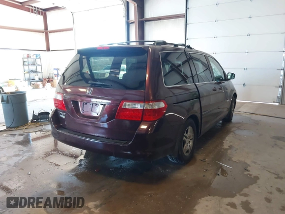 2007 Honda Odyssey EX-L with VIN 5FNRL38727B066885, listed as a IAAI auction lot 41317374 with 220,243 mi miles. Bid and sale history available at carsss.com. Image 4.