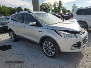 2014 Ford Escape SE with VIN 1FMCU9G97EUE10882, listed as a Copart auction lot 58770725 with 128,167 mi miles and Clean title. Bid and sale history available at DreamBid. Image 4.