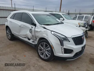2024 Cadillac XT5 Premium Luxury AWD with VIN 1GYKNERSXRZ707816, listed as a IAAI auction lot 41749596 with 8,701 mi miles. Bid and sale history available at carsss.com. Image 1.