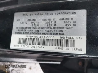 2014 Mazda 3 i Grand Touring with VIN JM1BM1W79E1155302, listed as a IAAI auction lot 41512501 with 98,635 mi miles and . Bid and sale history available at DreamBid. Image 9.