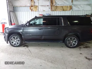 2015 GMC Yukon XL SLT with VIN 1GKS2HKC6FR667110, listed as a IAAI auction lot 41472250 with 141,383 mi miles. Bid and sale history available at carsss.com. Image 14.