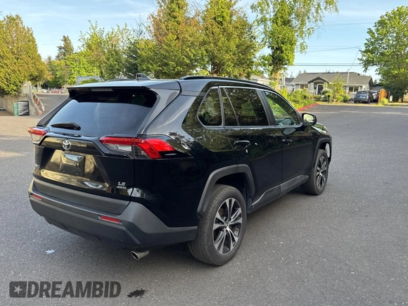 2019 Toyota RAV4 LE with VIN JTMF1RFV4KD030550, listed as a Copart auction lot 55537415 with 92,319 mi miles and Clean Title. Bid and sale history available at DreamBid. Image 4.