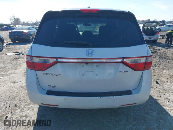 2012 Honda Odyssey Touring with VIN 5FNRL5H96CB010696, listed as a IAAI auction lot 41605868 with 109,411 mi miles and . Bid and sale history available at carsss.com. Image 16.