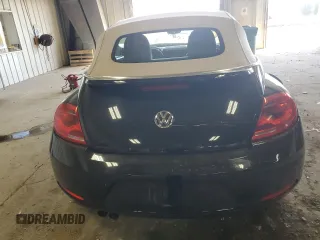2013 Volkswagen Beetle 2.5L с VIN 3VW5P7AT5DM811974, выставлен на аукционе Copart как лот 56853015 с пробегом 68 959 миль миль и На запчасти • Non repairable. История ставок и продаж доступна на DreamBid. Изображение 6.