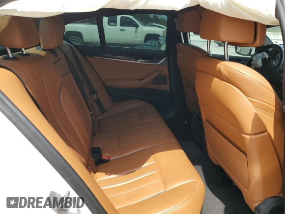 2018 BMW 5 Series 530i z VIN WBAJA5C50JG899776, wystawiony jako Copart lot #55436075 z przebiegiem Nie podano mil oraz Szkoda całkowita • Salvage title. Historia ofert i sprzedaży dostępna na DreamBid. Obrazek 10.