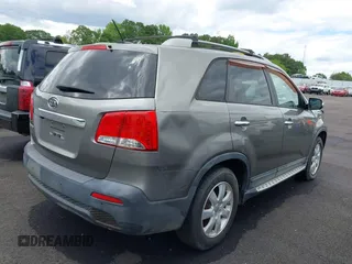 2012 Kia Sorento LX with VIN 5XYKT3A60CG285902, listed as a IAAI auction lot 42142043 with 225,206 mi miles and . Bid and sale history available at carsss.com. Image 4.