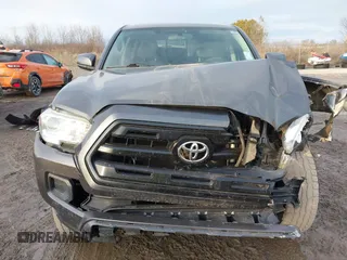 2016 Toyota Tacoma SR5 with VIN 5TFAX5GN1GX056450, listed as a IAAI auction lot 41215339 with 129,604 mi miles. Bid and sale history available at carsss.com. Image 18.