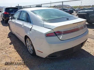 2016 Lincoln MKZ z VIN 3LN6L2GK1GR604523, wystawiony jako IAAI lot #42005012 z przebiegiem 215 285 mil mil oraz . Historia ofert i sprzedaży dostępna na DreamBid. Obrazek 3.