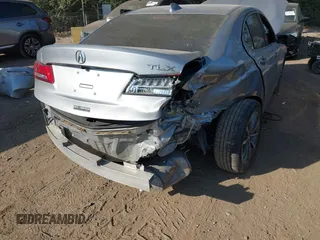 2019 Acura TLX with VIN 19UUB1F3XKA009385, listed as a IAAI auction lot 40584274 with 61,376 mi miles. Bid and sale history available at carsss.com. Image 6.