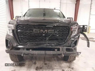 2020 GMC Sierra 1500 Denali with VIN 1GTU9FEL8LZ176453, listed as a IAAI auction lot 42194497 with 64,932 mi miles and . Bid and sale history available at DreamBid. Image 12.