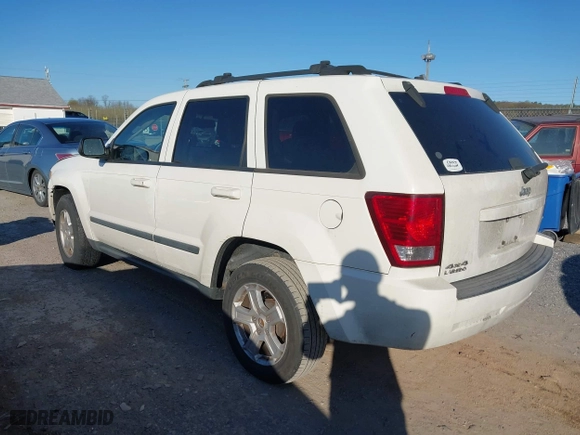 2007 Jeep Grand Cherokee Laredo with VIN 1J8GR48K37C525797, listed as a IAAI auction lot 41929118 with 244,092 mi miles. Bid and sale history available at carsss.com. Image 3.