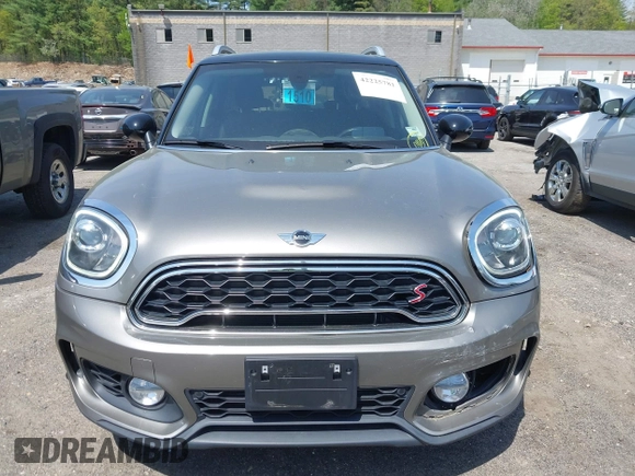 2017 MINI Countryman Cooper S z VIN WMZYT5C33H3D79148, wystawiony jako IAAI lot #42225781 z przebiegiem 95 023 mil mil oraz . Historia ofert i sprzedaży dostępna na DreamBid. Obrazek 12.
