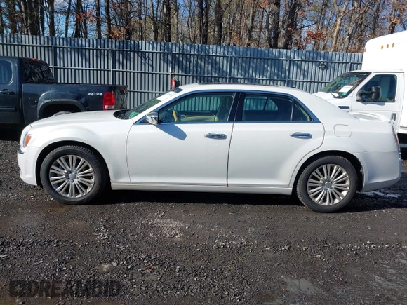 2013 Chrysler 300 with VIN 2C3CCAKGXDH733148, listed as a IAAI auction lot 41541442 with 216,074 mi miles. Bid and sale history available at carsss.com. Image 14.