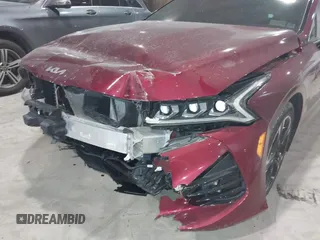 2022 Kia K5 GT-Line z VIN 5XXG64J26NG132254, wystawiony jako IAAI lot #41410563 z przebiegiem 29 345 mil mil oraz . Historia ofert i sprzedaży dostępna na DreamBid. Obrazek 17.